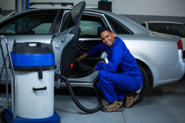 Professional mobile car wash plans van servicing a vehicle in Gauteng Mobile Car Wash Plans Gauteng detailer cleaning a luxury car